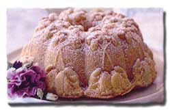 Violet Cake Pan with <u>Commercial</u> Non Stick Coating10 cup capacity. Overall size of pan: 9.5"x4" deep.