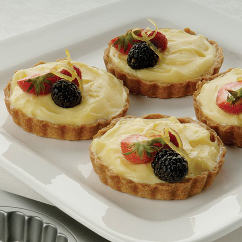 Focus Foodservice 4 Cup Fluted Mini Tartlet Pan Loose Removable Bottom, each 3.5" x .9" image 1