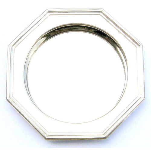 Stainless steel octagonal tray with satin-finish bottom and mirror-finish upper. 1" outer height, 3/4" inner depth. Round inner flat part is 5" diameter. Available here in limited quant