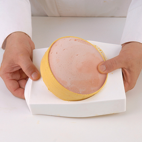 Reverse side of unmolded dessert, with dome protruding