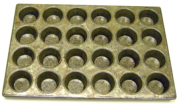 Cupcake/Muffin Pan, USED & REGLAZED, 24 Cups. Cup size: 2-3/4" dia. 1-3/8" deep. Overall size: 14" x 20-2/3"