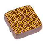 PCB Chocolate Transfer Sheet: Gold Spirals. Each sheet 16